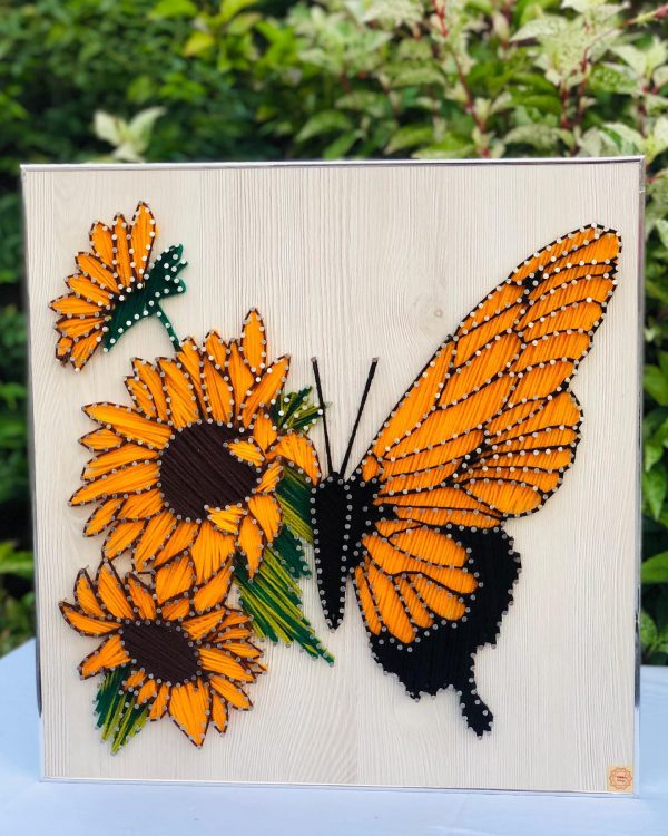 The butterfly on flowers — custom string art Pakistan handmade by Woody Strings Lahore Pakistan