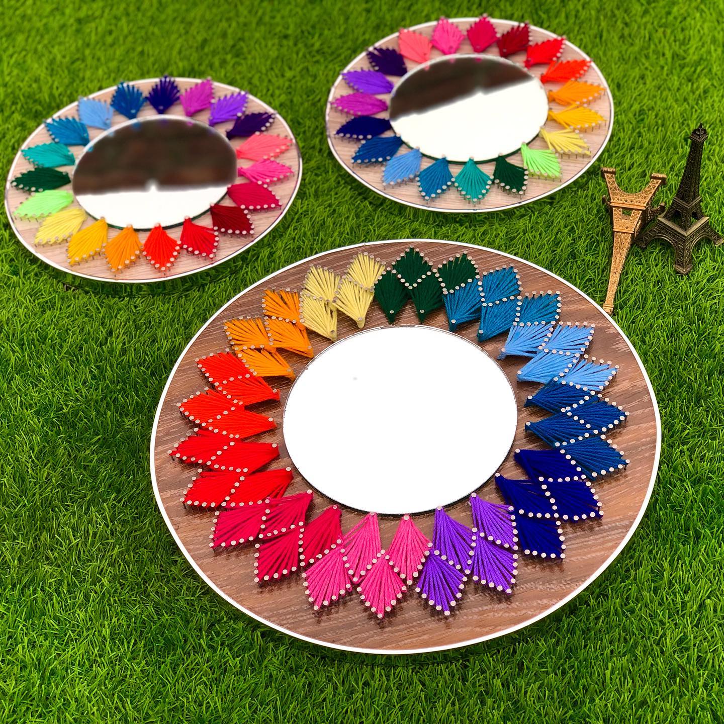 Get these vibrant and beautiful string art mirrors now only from — custom string art Pakistan handmade by Woody Strings Lahor
