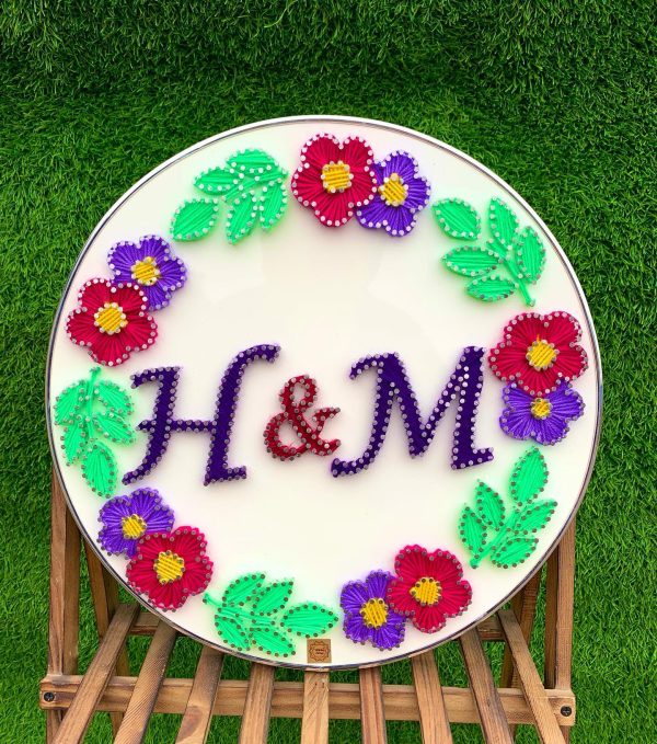 Name initials board with floral wreath — custom string art Pakistan handmade by Woody Strings Lahore Pakistan