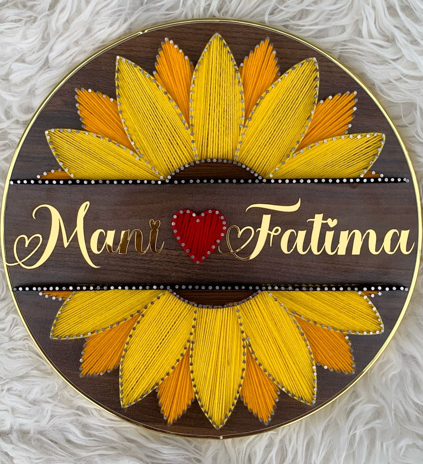 A timeless sunflower frame with golden acrylic names — custom name string art handmade by Woody Strings Lahore Pakistan