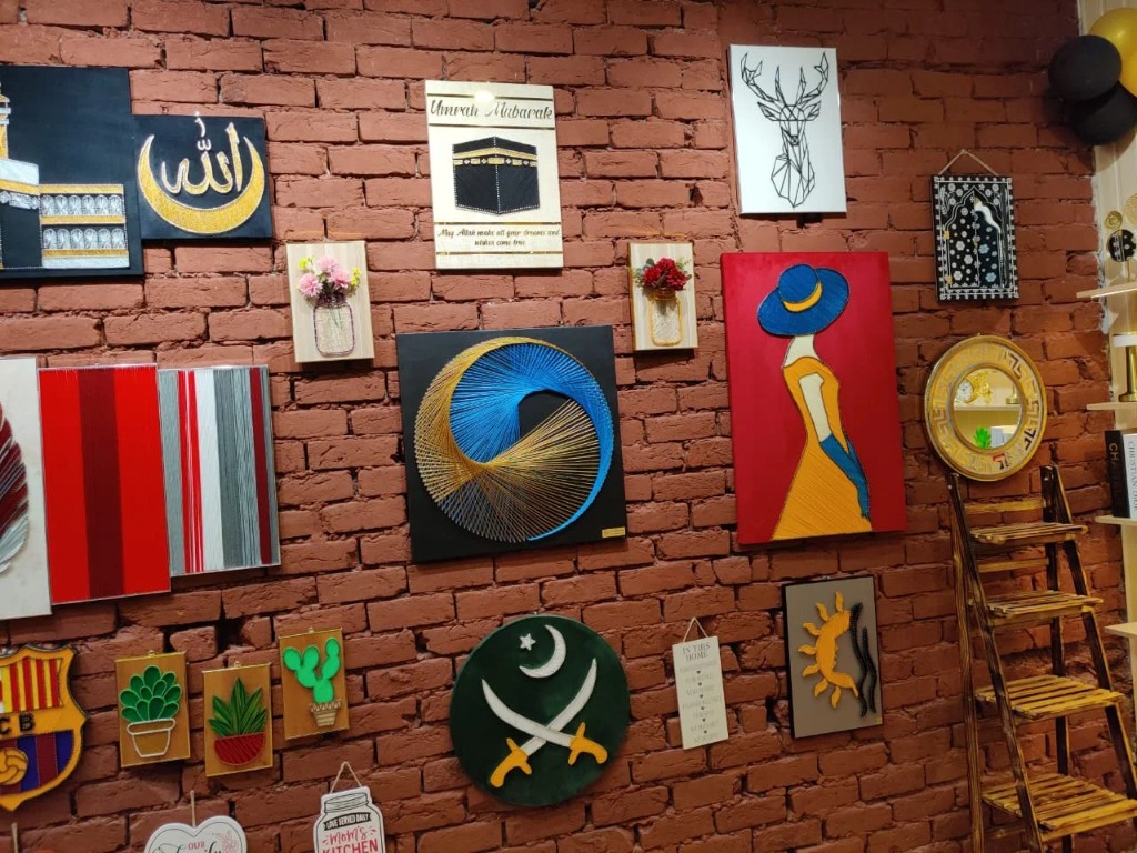 Handmade pieces on our brick wall
